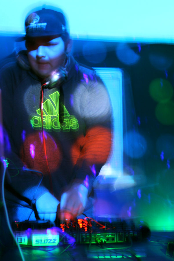 Junior J.P. Stephens (DJ Slozz) performs as DJ at the Yellow Fiddle Friday night.

 Michael Kavitz/Printz