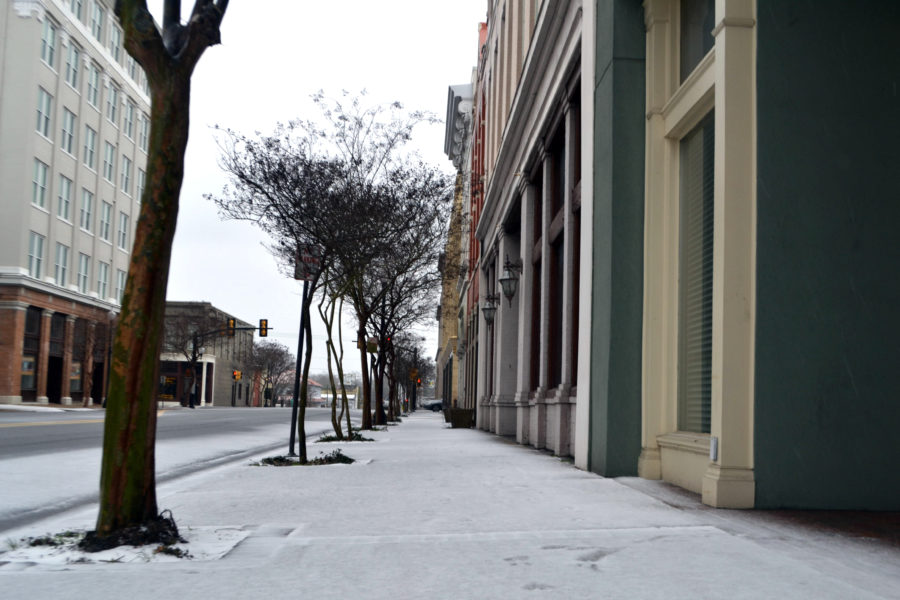 Snow falls in downtown Hattiesburg on Tuesday, Jan. 28.