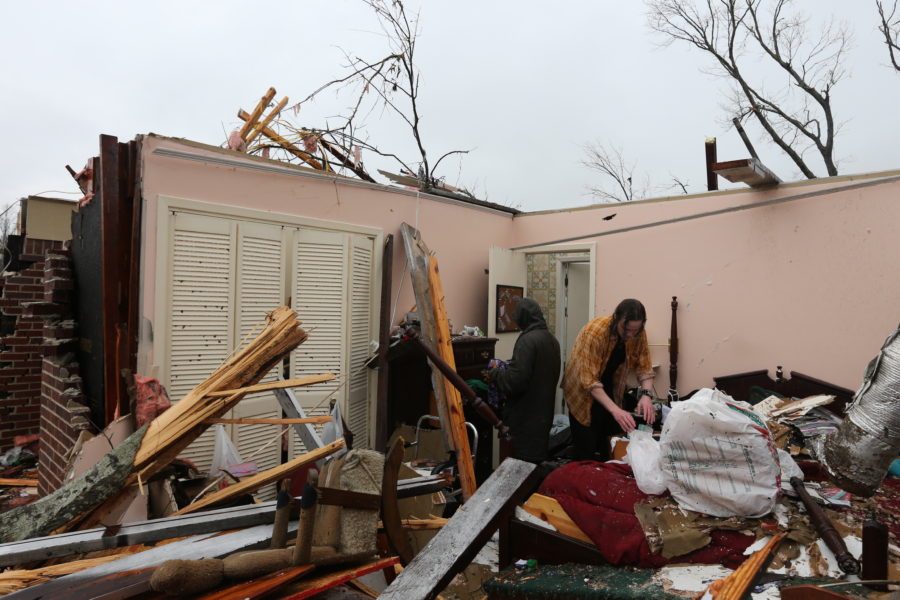  Michael and Shannon Pierce salvage valuables from their parent’s bedroom after the tornado Feb. 10, 2013.

Courtesy photo