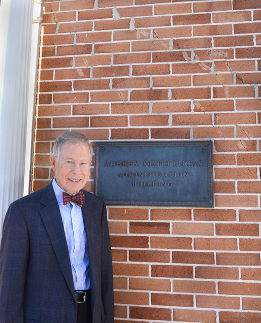 50 years ago yesterday, an atomic bomb was tested in a town just west of Hattiesburg.  Dr. Aubrey K. Lucas stands next to a diagonal crack it caused in the brick on the administration building at the front of campus.
