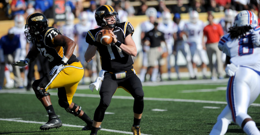 Southern Miss quarterback Cole Weeks goes for a pass against La. Tech in Hattiesburg, MS. Saturday, Oct. 25, 2014.  This past weekend the Golden Eagles fell to UTEP, 35-14.- Susan Broadbridge/Printz