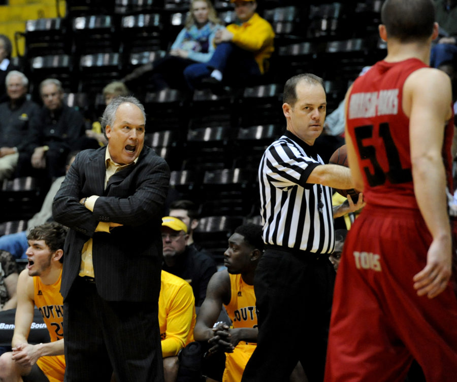 Southern Miss head coach Doc Sadler yells at the referee during the Saturday night home game against Western Kentucky.  The Golden Eagles fall, 73-62.