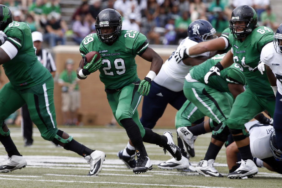 Sep 19, 2015; Denton, TX, USA;  North Texas Mean Green running back Willy Ivery (29) runs the ball in the first half against the Rice Owls at Apogee Stadium. Rice won 38-24. Mandatory Credit: Tim Heitman-USA TODAY Sports