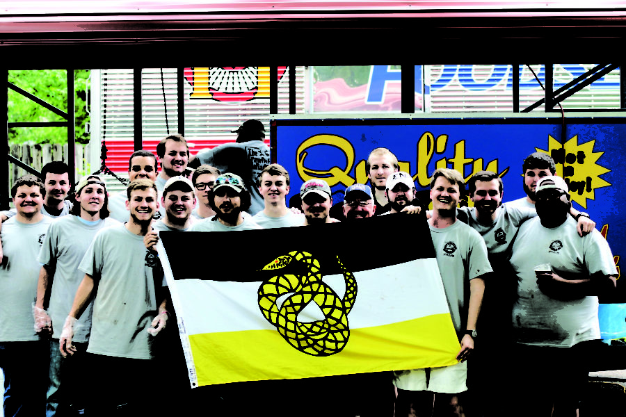 Sigma Nu Fraternity from Southern Miss pose for a picture at the 18th Annual Downtown Crawfish Jam.