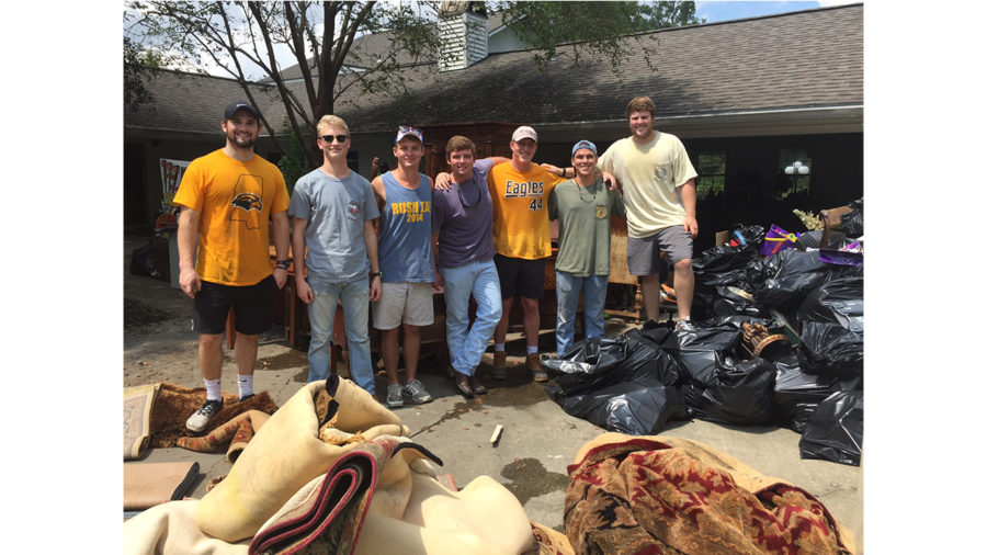 Frats+lend+hand+to+flooded+homes