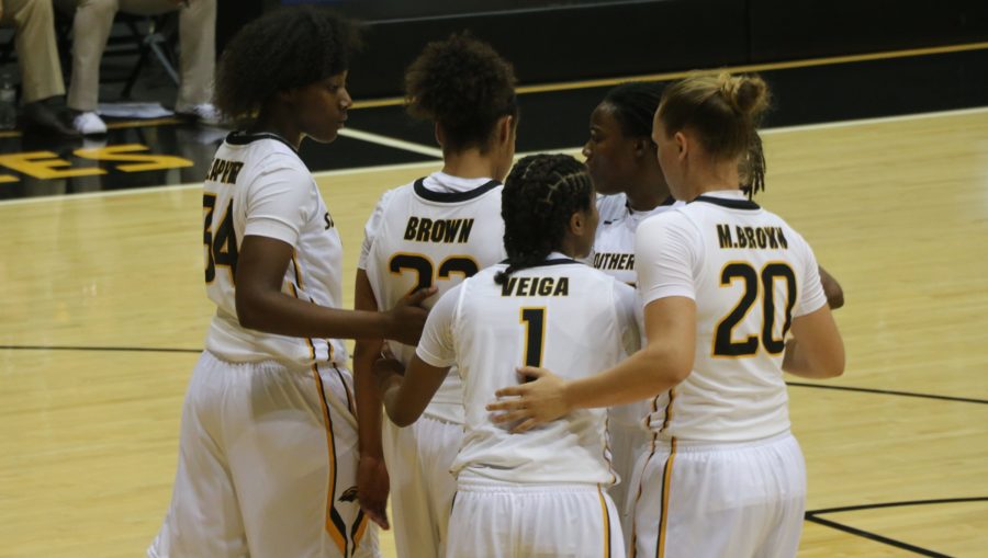 The Lady Eagles huddle before a free throw at Reed Green Coliseum on Nov. 8 against Mississippi College.