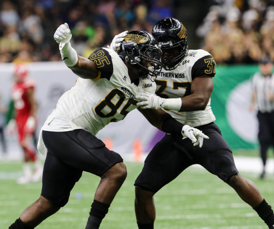 Southern Miss defensive lineman JaBoore Poole (85) celebrates a successful tackle against the Ragin Cajuns  at the New Orleans Bowl on Dec. 17, 2016 in New Orleans, Louisiana.