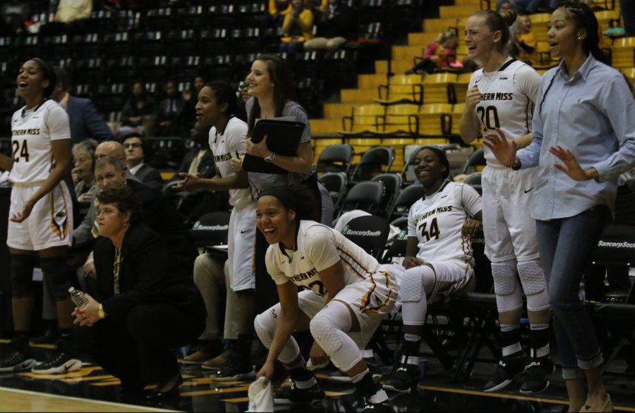The Southern Miss bench celebrates during USMs 64-59 over UAB on Jan. 28 in Reed Green Coliseum.