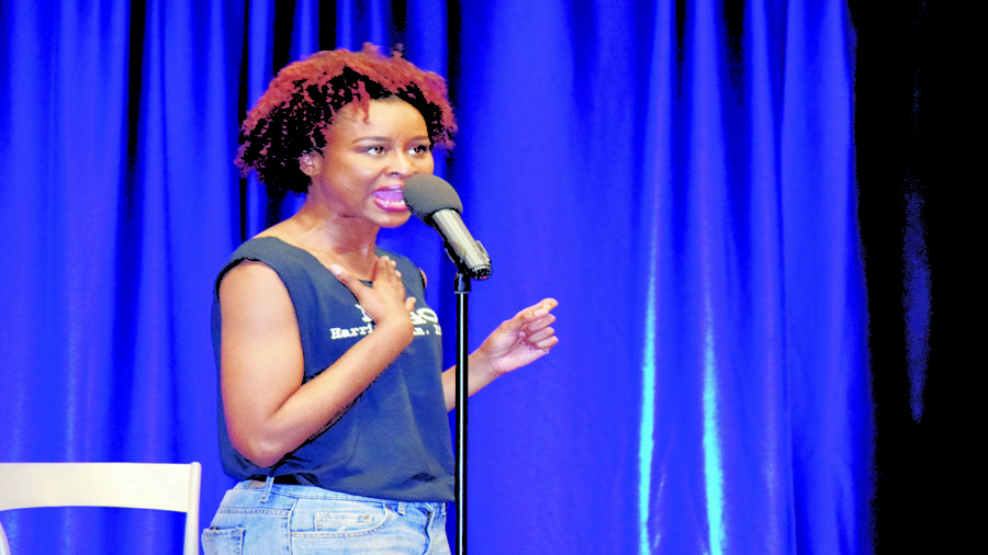The bold and powerful Kayla Lacey performs at the Spoken Word Night hosted by the Southern Miss Activities Council (SMAC) for the black history month.