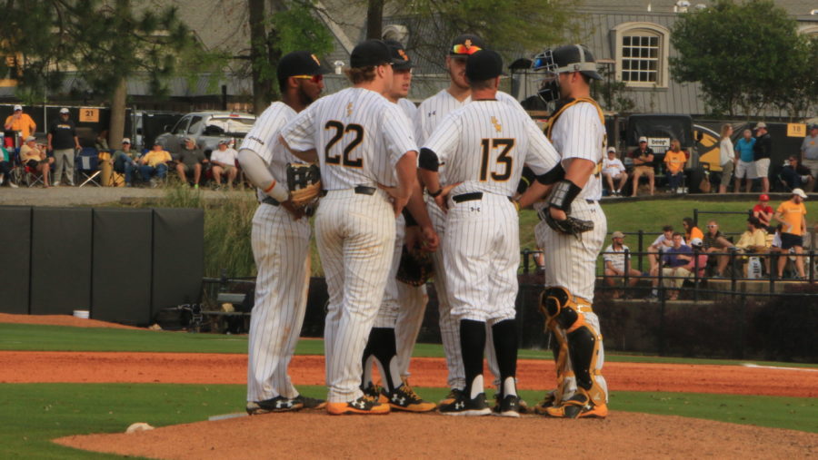 The USM infield huddles on the mound at Pete Taylor Park in a 5-3 win against Marshall.