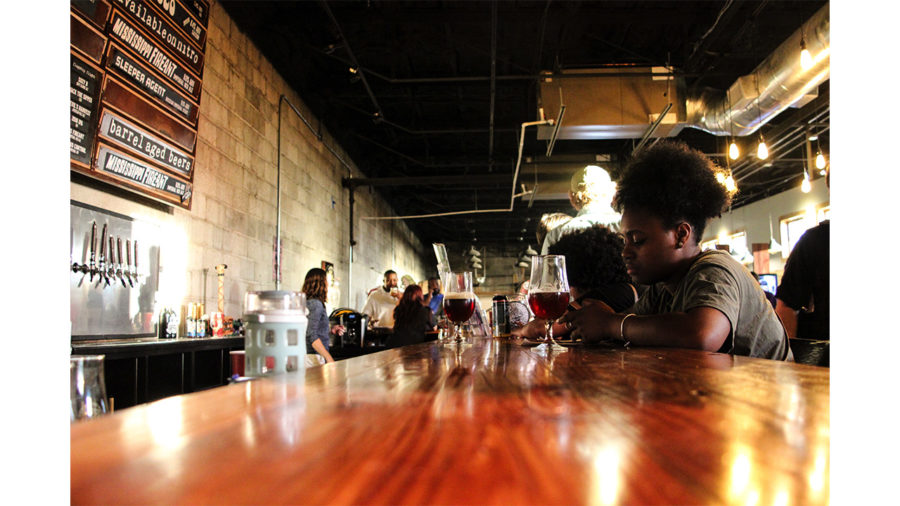 Patrons+enjoy+a+beer+at+Southern+Prohibition+Tap+Room.