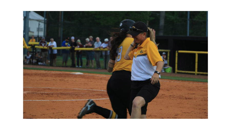 USM+coach+Wendy+Hogue+and+designated+hitter+Jade+Lewis+celebrate+after+Lewis+home+run+against+Mississippi+State+on+Mar.+28+at+the+USM+Softball+Complex.