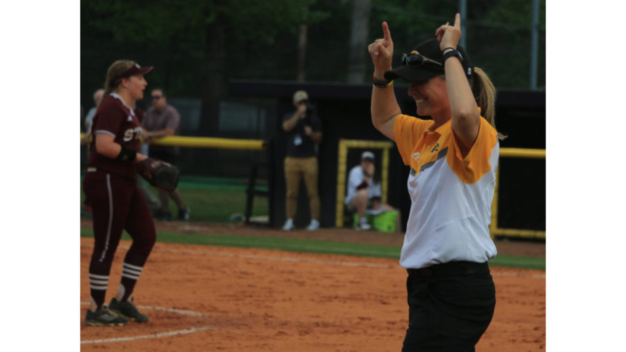 Southern Miss coach Wendy Hogue celebrates a home run against Mississippi State on Mar. 28 in a home contest.