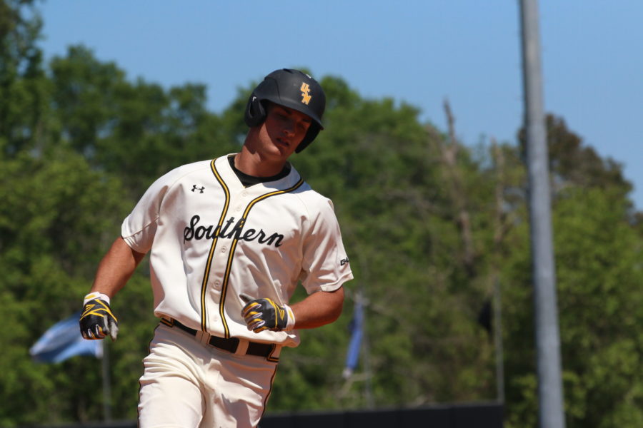 Outfielder Matt Wallner rounds the bases against Florida International on April 9 at Pete Taylor Park. 