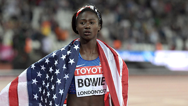 Aug 6, 2017; London, United Kingdom; Tori Bowie (USA) takes a victory lap with United States flag after winning the womens 100m in 10.85 during the IAAF World Championships in Athletics at London Stadium at Queen Elizabeth Park. Mandatory Credit: Kirby Lee-USA TODAY Sports
