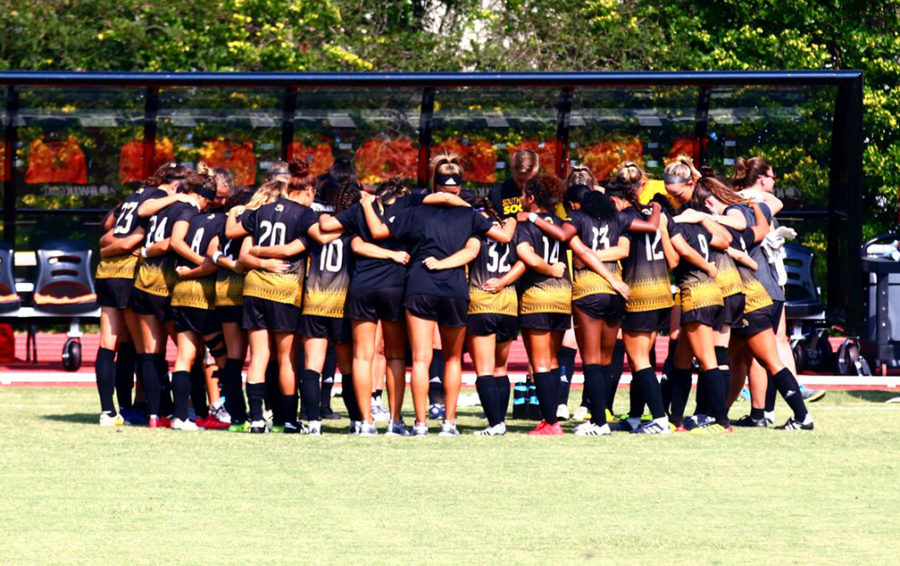 Southern Miss soccer team joins together for Nation Anthem 
Photo by: Maggie Matteson