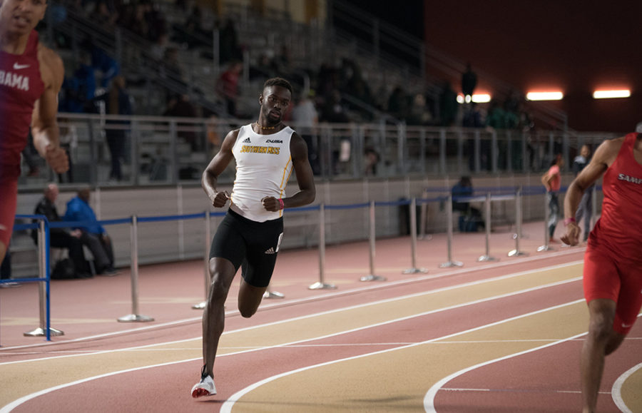 Mamadou Seck runs the Mens 600 meter dash (Sandoz) 