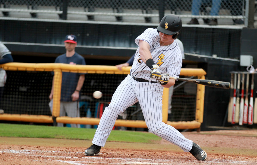 Freshman Charlie Fisher swings at a ball against Gonzaga on March 2. 

Photo by: Makayla Puckett