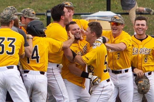 Byrant+Bowen+celebrates+walk-off+win+against+Marshall.+%0A%0APhoto+by%3A+Brad+Crowe
