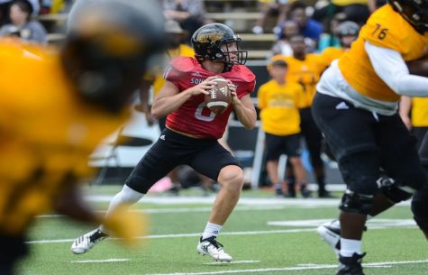 Whatley drops back to throw pass in spring game.

Photo by: Makayla Puckett
