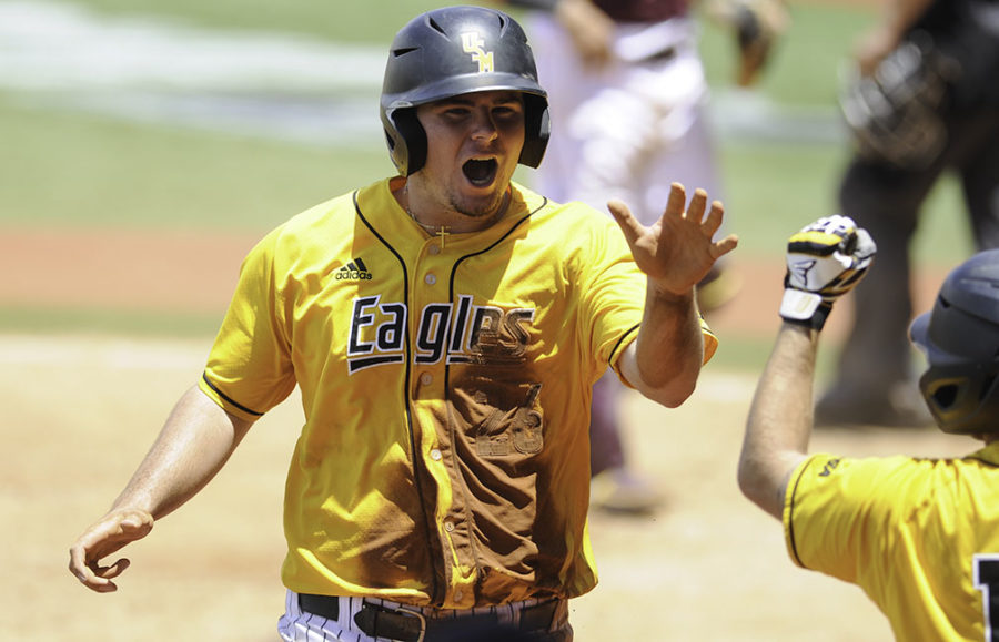 Freshman Danny Lynch celebrates another run by Southern Miss in Game 1 of the Baton Rouge Regional. 

Photo by: Makayla Puckett