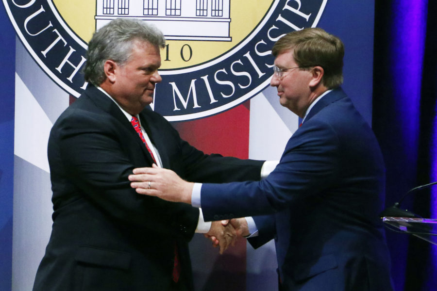 Democratic+State+Attorney+General+Jim+Hood%2C+left+and+Republican+Lt.+Gov.+Tate+Reeves%2C+right%2C+shake+hands+at+the+conclusion+of+their+first+televised+gubernatorial+debate+at+the+University+of+Southern+Mississippi+in+Hattiesburg%2C+Miss.%2C+Thursday%2C+Oct.+10%2C+2019.+%28AP+Photo%2FRogelio+V.+Solis%29
