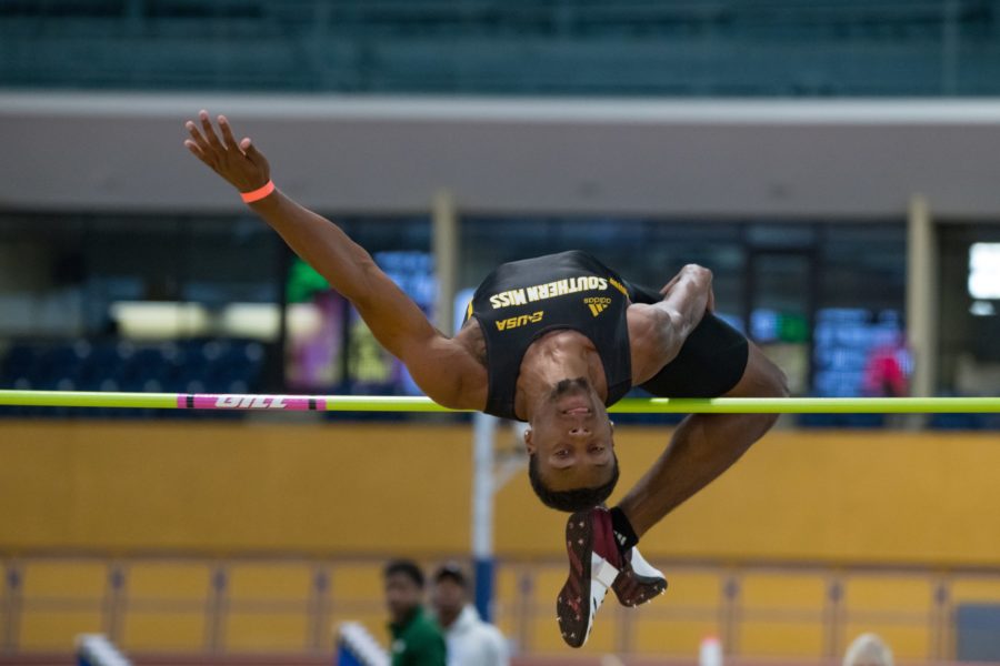 Eric Richards clears a height in the Mens High Jump.
Photo by Michael Sandoz