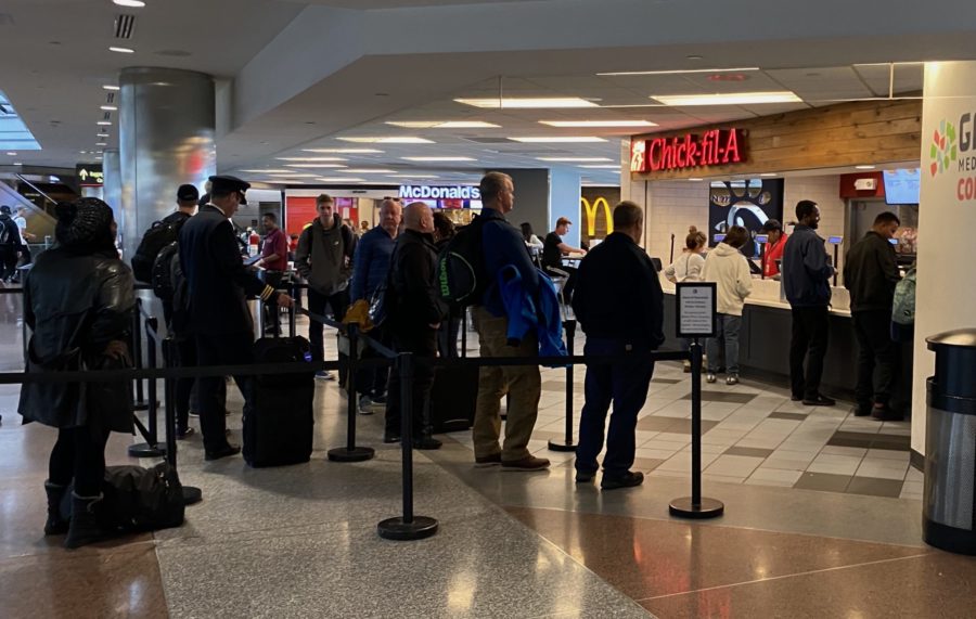 Travelers in line at the Denver Airports Chick-fil-a. Photo by Jack McCallum.