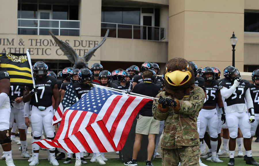  Seymour leads the Golden Eagles to the field for Military Appreciation Day at the Rock. Photo by Niusha Karki.