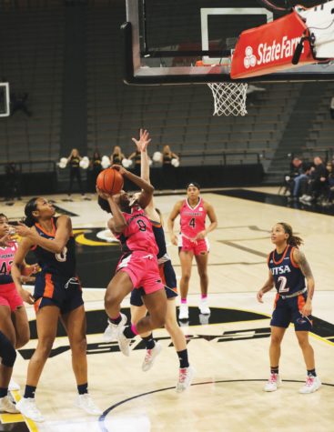 Southern Miss guard Brikayla Gray attempts a layup in an overtime win against UTSA to move into first place in the West Division. (Photo/Tyron Dawson)