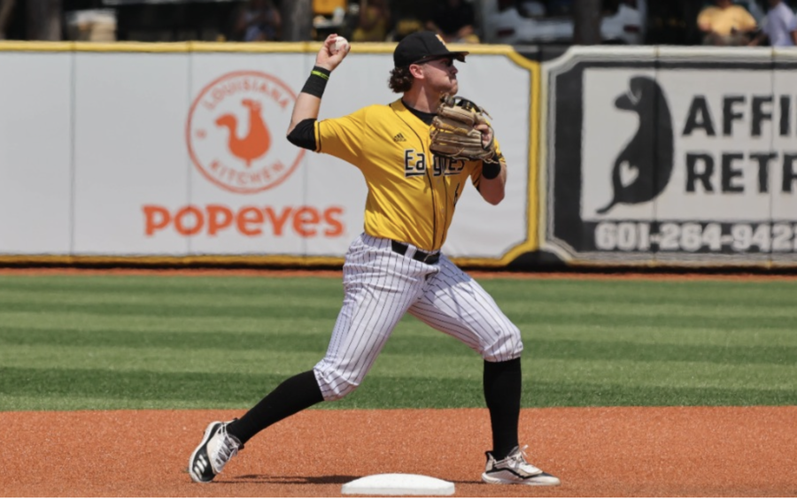 Southern Miss infielder Will McGillis throws ball to first base| Photo by Southern Miss Athletics