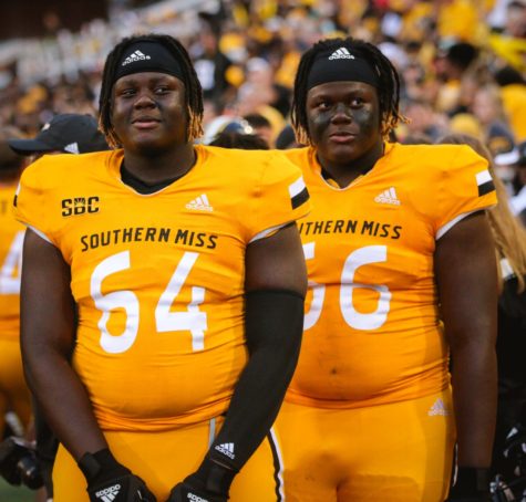Kyron and Kamron Barnes stand next to each other during their first game at Southern Miss. | Photos: Charlie Luttrell