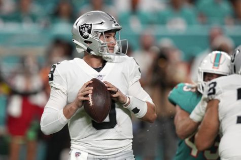 Nick Mullens of the Las Vegas Raiders attempts a pass during the second quarter against the Miami Dolphins at Hard Rock Stadium on Aug. 20, 2022, in Miami Gardens, Florida.