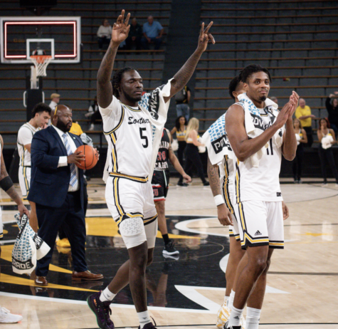 DeAndre Pickney celebrates after a home win against Loyola.
