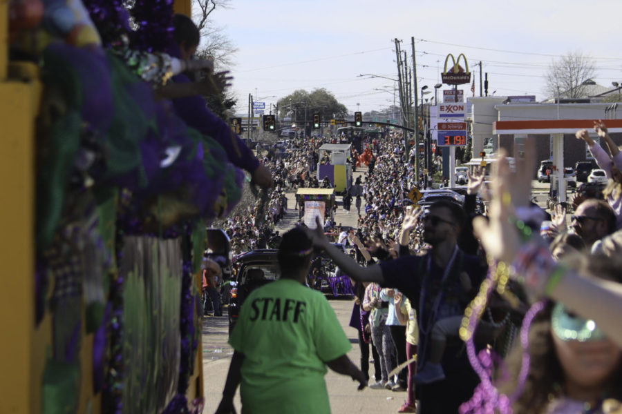Parade attendees line Hardy Street as floats head westward during Hattiesburgs Caerus Parade for Mardi Gras on Hardy Street on February 18, 2023.