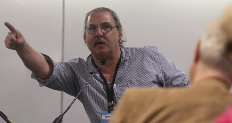 David Rae Morris, who co-authored the book My Mississippi with his father, points to the crowd while during a discussion with moderator Michael Tisserand on Friday, March 10, 2023 at the New Orleans Book Festival.