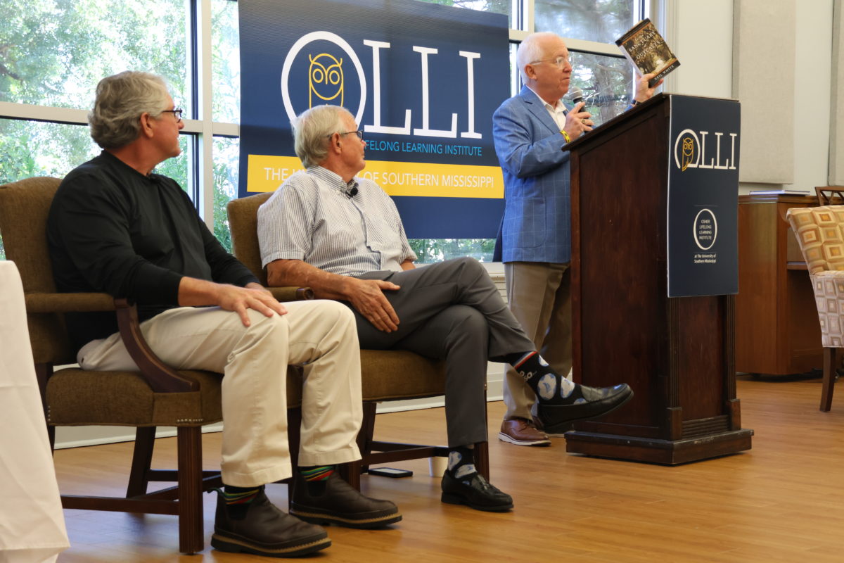 USM President, Dr. Joe Paul introduces Neil White and Rick Cleveland to the OLLI audience.