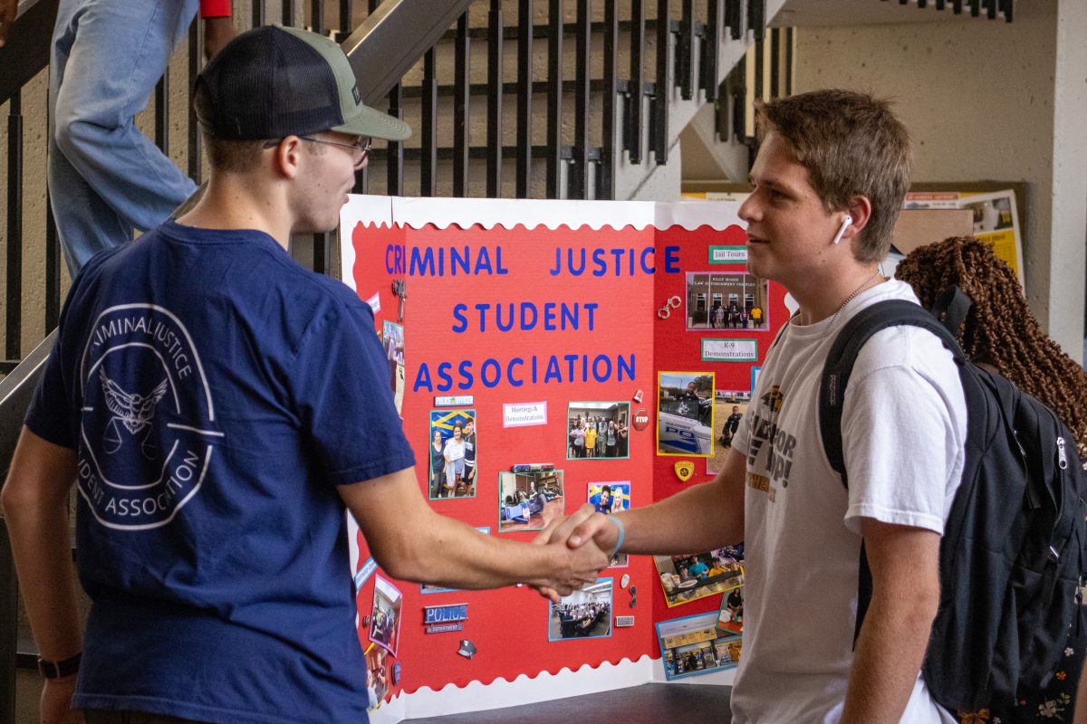 USM students converse at the recent Student Involvement Fair on campus.