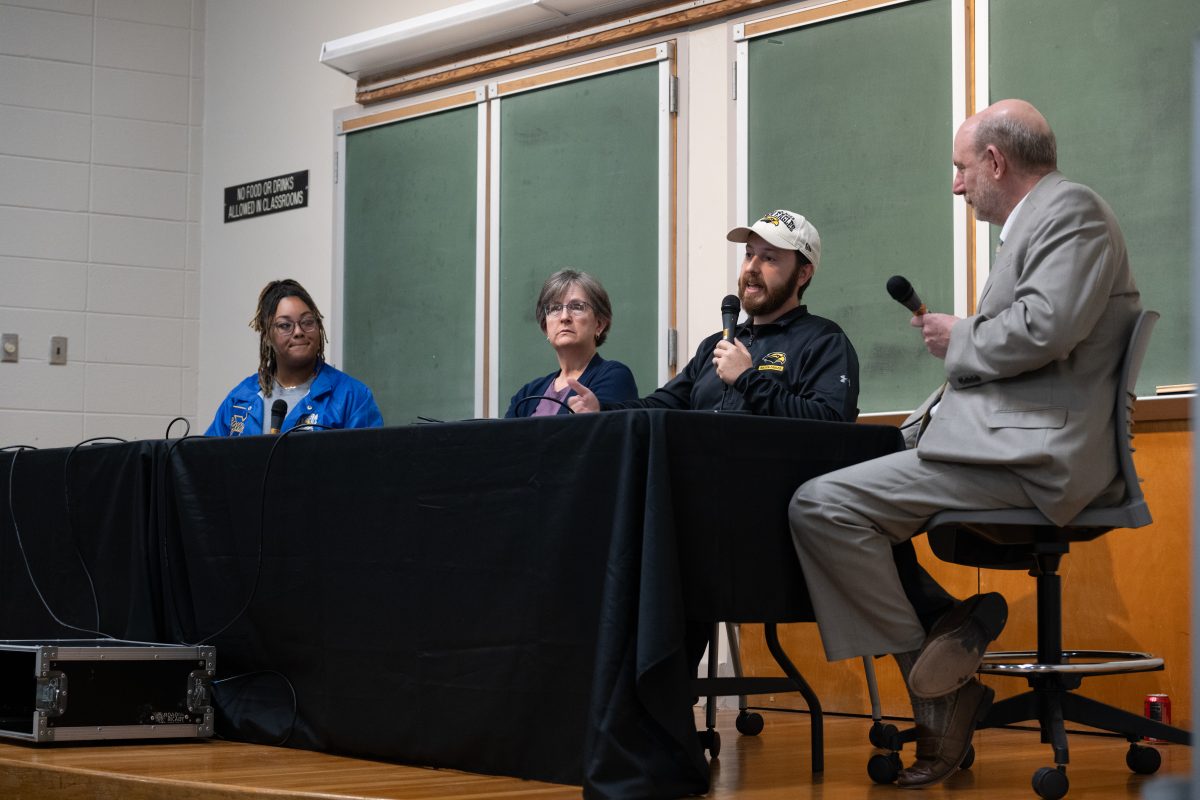 Dr. Edgar Simpson, Director of the USM School of Media and Communication, moderates the News You Need panel with Dr. Brent Hale, Assistant Professor of Communication Studies, Dr. Ann Marie Kinnell, Associate Professor and Director of Interdisciplinary Studies; and Lillian Scott, the student producer of News You Need.