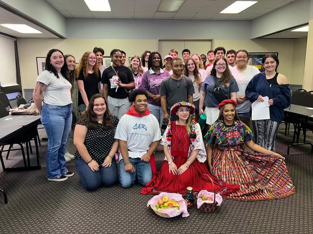 Professor Liseth Wug and her Spanish Club students recently gathered after she did a presentation about Guatemala. 