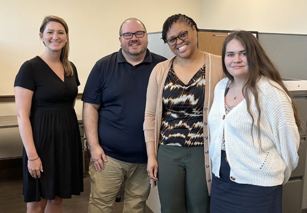 Employees of the Roy Howard Community Journalism Center include Whitney Argenbright, Joshua Wilson, Nichole Cyprian, and Sarah Grace Meyn.