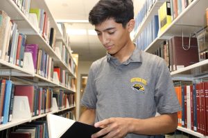 USM's Jose Mendez catches up on research.