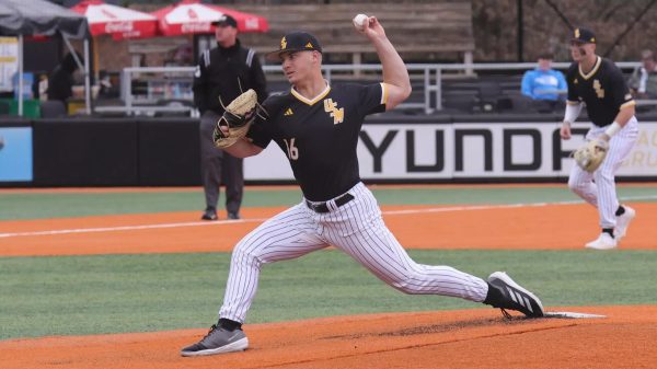 Southern Miss. pitcher Graden Harris (16) throws a pitch in a game between the Southern Miss Golden Eagles and the Louisiana Ragin' Cajuns.