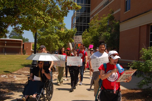 United Campus Workers union members protest on the USM campus.