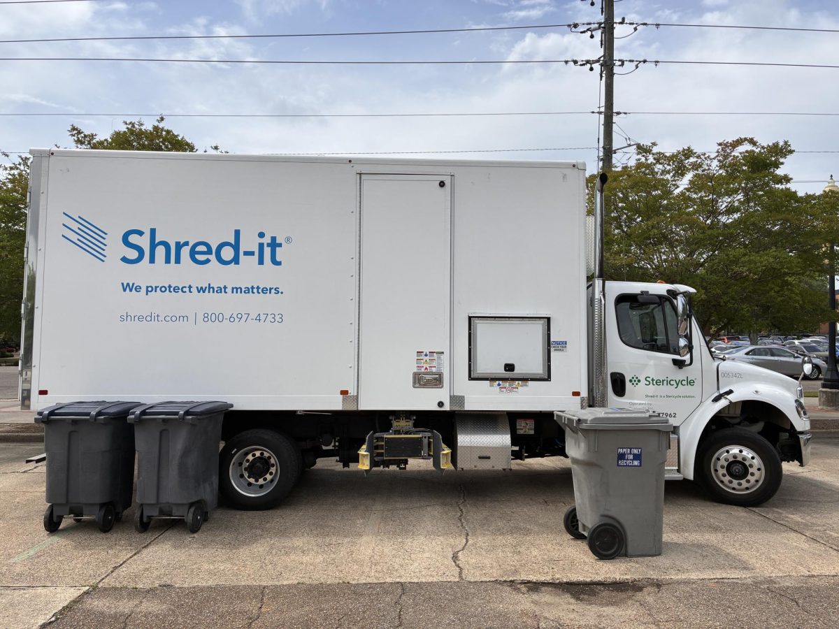 The Shred-it truck at the Physical Plant where community members came out to dispose of old documents and devices.
