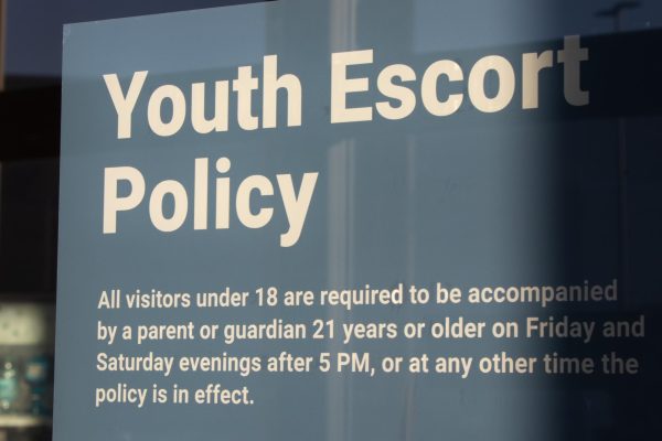A Turtle Creek Mall sign displaying the mall’s youth policy.