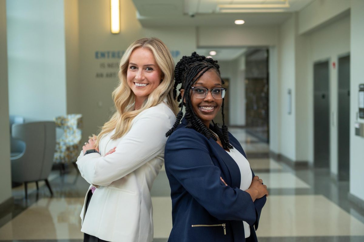 Nila Griffin (Left) and Laura Stovall (Right) posing together in Scianna Hall. 