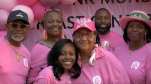 Participants of Hattiesburg's Pink Monday Celebration, a tradition dedicated to raising awareness for breast cancer and honoring survivors.