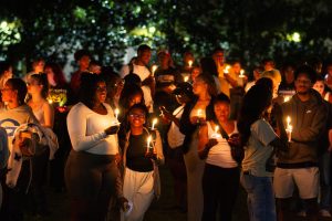 USM students pay tribute to Trey Reed during a recent candlelight vigil on campus.