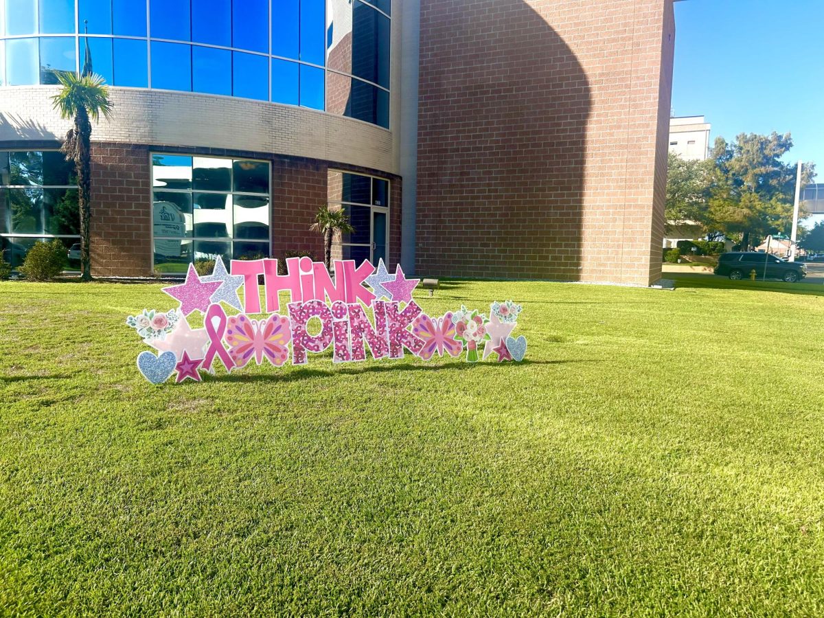 "Think Pink" and the Pink Ribbon symbolizes Breast Cancer Awareness.